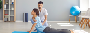 Physiotherapist, Sports Therapist, Osteopath with patient