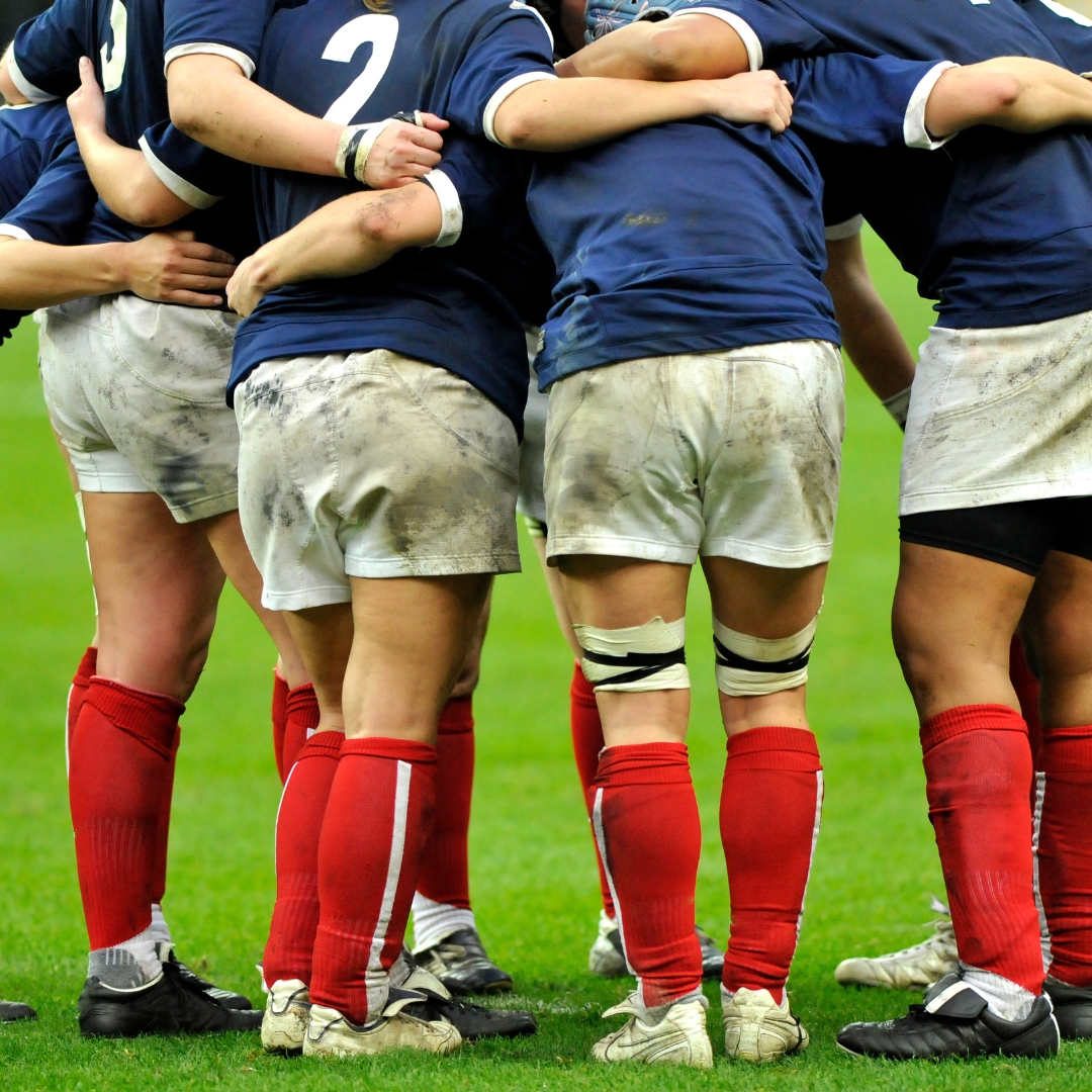 rugby player huddle